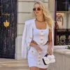 Arbetsklänningar Fu Rui 2024 Autumn White Fashion Versatile Bandage Top High midja Kort kjol Tvåverk Set Women's Birthday Wholesale