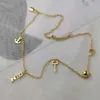 Designer celline Saijia New Key Lock Head Letter Necklace Female Ship Anchor Small Golden Ball Pendant High Sense Temperament Tassel Clavicle Chain