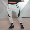 Herrbyxor sportbyxor män bomull fitness spårbyxor som kör byxor jogga män snabb torr lapp gym sweatpants träning byxor joggar man t240227