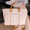 Tasarımcı Çanta Kadınlar Lüks El Tuval Beach Bag Tote Çanta Klasik Büyük Sırt Çantaları Kapasite Küçük Zincir Paketleri Büyük Crossbody D874 Fabrika Mağazası ABD Satış