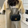 Textura popular corrente crossbody 2024 novo xiaoxiangjia bloqueio fivela ombro único portátil na moda bolsa feminina 75% fábrica atacado