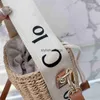 Sacs à bandoulière Clobag chaud sac fourre-tout tissage sac à main de créateur mode lettres imprimer plage paille tresse seau bandoulière h24227