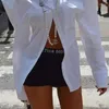 女性用ブラウスARDMセクシーなバックレスボタンアップストリートウェアオートンシャツホワイトロングスリーブトップポケットポロシャツ女性2024