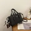 Jesienna zima dla kobiet w 2024 r. Nowe ręczne wiadro sznurka ze stylowym designem i teksturą na jedno ramieniu torba crossbody 75% Hurtowa fabryka