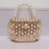 Schoudertassen Hollow Out Pearl Water Diamond Full Sky Star Vogelkooitas Diner Internet Rood en modieus Handketting Crossbody Dames Premium 240427