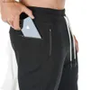 Męskie spodnie czarne joggery spodnie dresowe mężczyźni szczupłe spodnie Casual Solid Color Gym trening bawełniany sportowiec jesień męski fitness trackpants t240227