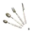 Ensembles de vaisselle Europe mode perle ensemble de couverts en acier inoxydable créativité couteau cadeau fourchette vaisselle couverts poignée en céramique Spo D3R1