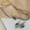 Orecchini di collana impostati 2024 Clip in pietra panlong in metallo unica per donne geometriche a cerchio rotondo per la festa di perle intaglia