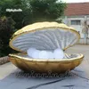 wholesale Ballon de moule LED de modèle animal marin soufflé par air d'éclairage géant de coquille de palourde gonflable d'or adapté aux besoins du client avec des perles pour la décoration de mariage