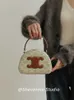 Triomphes donna Borsa a mano firmata Borsa a tracolla Borse Scatola semicircolare a mano a mezzaluna vintage a spalla singola da donna alla moda