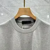 夏の男性デザイナーTシャツコットンルースカジュアルティーレター半袖シャツファッションヒップホップストリートウェアの服