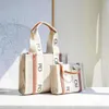 Tela di alta qualità Borsa tote grande in legno Borsa di lusso Borsa da donna a tracolla Borsa a tracolla Borsa a tracolla CrossBody moda donna Frizione weekender viaggio estate Borsa da spiaggia