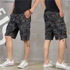 Men's Shorts Nouvel été hommes Baggy Multi poche militaire Camo Shorts Cargo lâche culotte chaude mâle Long Camouflage Bermuda Capris grande taille T240227