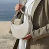 デザイナーのショルダーバッグnumero dix半月バッグフルグレインテクスチャー/滑らかな子牛革革の特徴的なトートクロスボディ女性ホーボーハンドバッグ財布