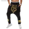 Calças masculinas novo 2021 primavera outono casual baixa virilha hip hop feixe pé perna calças streetwear dança de rua número ouro impresso calças masculinas t240229