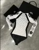 C C Costume da bagno da donna della serie di sci del designer di marca numero 5 slip personalizzati di fascia alta un pezzo manica lunga vacanza al mare sport vento Costume da bagno a manica lunga con protezione solare