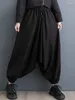 Spodnie damskie japoński styl wysoki talia ciemna czarna szykowna wiosenna swobodna wisząca krocza moda mody luźna szeroka noga harem