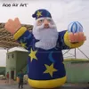 Partihandel 8m 26.2ft höggigant Ryssland Style Santa Claus gummibåtar Jul Fader Air Blown Santa Ord Man med ballong i hand till salu