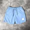 Diseñador Diseñador Pantalones cortos para hombre Moda de verano Pantalones de playa Hombres Ropa de calle de alta calidad Rojo Azul Negro Pantalones morados Pantalones cortos sueltos para hombre diseñadorFGIA