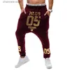 Calças masculinas novo 2021 primavera outono casual baixa virilha hip hop feixe pé perna calças streetwear dança de rua número ouro impresso calças masculinas t240229