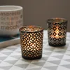 Svart och guld perforerat glas votive cup traditionell geometrisk gitterljushållare tealight burk för födelsedag bröllop dekoration