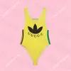 Costume da bagno intero da donna di design bikini giallo, costume da bagno a righe alla moda, costume da bagno da spiaggia estivo da donna