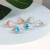 Boucles d'oreilles pour femmes, lumière de luxe en forme d'œuf, Zircon bleu, couleur argent, cadeau de mariée, bijoux à la mode E009