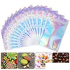 Sacs d'emballage Vente en gros 500pcs Sacs Mylar refermables Couleur holographique Mtiple Tailles Sac anti-odeur Clear Zip Lock Food Candy Stor DHCQA