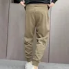 Męskie spodnie męskie elastyczne pasmo sznurka z pasmką kostki ciepłe kieszenie luźne dziewiąte workowate jogger sprężynne sprężyny dresowe