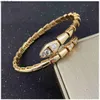 Serpentine titanium bracelet rose inlaid diamond star bracelet European and American couples fashion light luxury snake bone bracelet 240228
