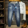 Jeans pour hommes 2024 printemps haut de gamme trou ample grande taille grande taille vêtements élégants pantalons élastiques à la cheville sous