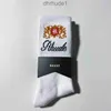 Chaussettes de Rhude Men Luxury Fashion Antibactérien Déodorant Sports Sports Bouchable Coton tricot Coton Populaire Haute qualité avec lettre blanche noir Soft Jx76