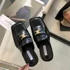 Metal Buckle Baotou Half Drag Female Wear Fashion 2024 Nowe europejskie i amerykańskie sandały na głowie Summer Sandals Lazy Mueller Buty