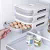 Slide Egg Storage Box Frigorifero Cassetto per uova Rack di stoccaggio Uova Rolling Food Grade Holder Vassoio Rotolamento automatico delle uova YFA1958