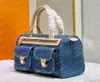 Denim Vintage Sacs à bandoulière Femmes Fourre-tout Sacs à main en toile Vieille fleur Sac sous les bras Sac à main imprimé Sac à dos Or Matériel Pochette M44472