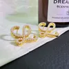 Orecchini da donna di gioielli Loe Geometry Orecchini avanzati Orecchini di perle d'argento piccoli lettere di design uniche semplici orecchini versatili personalizzati