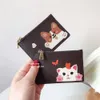 7A حقيبة جلدية حقيقية بطاقة Women Women Wallet Wallet Cartoon Cartoon Printed zipper ائتمان