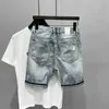 Herenshorts Nieuwe collectie van 2023 zomer heren casual denim shorts mode kat fluistert denim gescheurde noodlijdende patch strakke jeans J240228