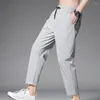 Pantalones deportivos para hombre, puños retráctiles, adiestramiento al aire libre, gimnasio, Fitness, tiro medio, secado rápido, pantalones de chándal de verano, ropa deportiva