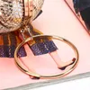 Gold Metal Clutch Bag Luxury Handväskor Kvinnor Väskor Designer Round Mini Hollow Purse Ladies Hand Prom Chain Crossbody 240223