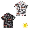 24SS Camisas Graffiti com Estampa Completa Homens Mulheres Havaí Praia Camisa