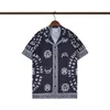 مصمم قميص 24SS زر الأسنان فوق قمصان طباعة البولينج قميص هاواي الأزهار القمصان غير الرسمية رجال رفيعة فستان قصير الأكمام فستان هاواي تي شيرت M-3XL 31