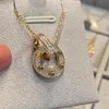 Designer ketting mode-sieraden voor minnaar mannen vrouwen dubbele ring volledige cz twee rijen diamanten hanger achthoekige schroefdop liefde ketting paar romantisch cadeau