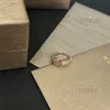 Pierścienie miłosne damskie męskie projektant bułgarnia para luksusowa biżuteria swobodna moda klasyczne damskie pierścienie Pierścień świątecznych 0126