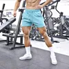 Calções masculinos esportes de fitness fino ajuste respirável algodão primavera verão casual cor sólida cordão rendas calças curtas dos homens