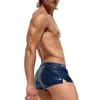 Shorts pour hommes Hommes Sexy Serré Casual 2024 Printemps Été Sans genre Individualité Discothèque Métallique Slim Couleur Unie Unisexe