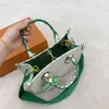 Petit sac fourre-tout en cuir blanc vert de créateur