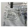 Pantaloncini di jeans rotti graffiati da uomo estivi Pantaloni jeans corti strappati elasticizzati di marca di moda per uomo 240226