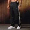 Calças masculinas estilo americano sweatpants fita listrada retalhos bordado casual jogger ginásio esportes fitness treinamento