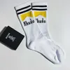 Rhude Men Choques femme Nouvelles lettres coton pur européen américain tendance de rue sports décontractés jogging chaussettes de basket de basket-ball luxe antibactérien respirant sports 1hbi